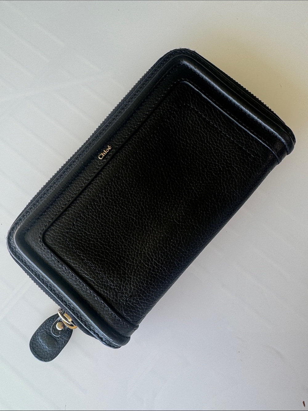 Chloé Black Pebbled Leather Zip Wallet with Gold Accent